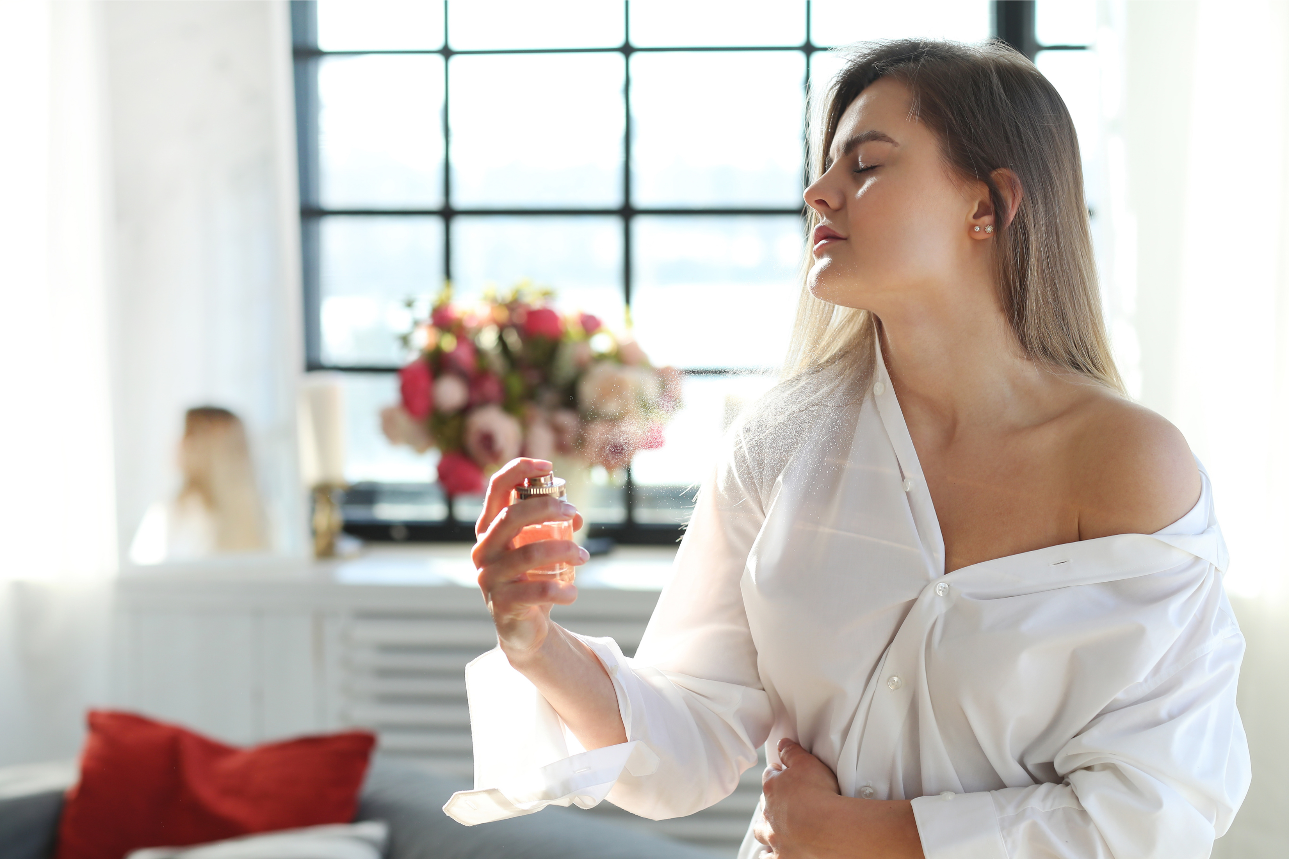 Young Woman applying perfume style